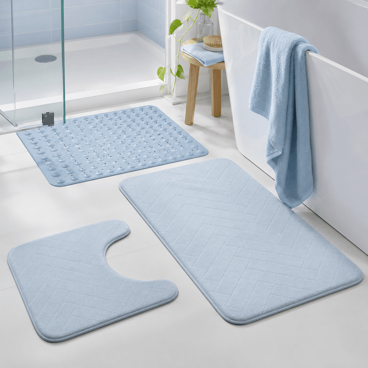 Non-Slip Bath Mat Set arranged in a bright bathroom