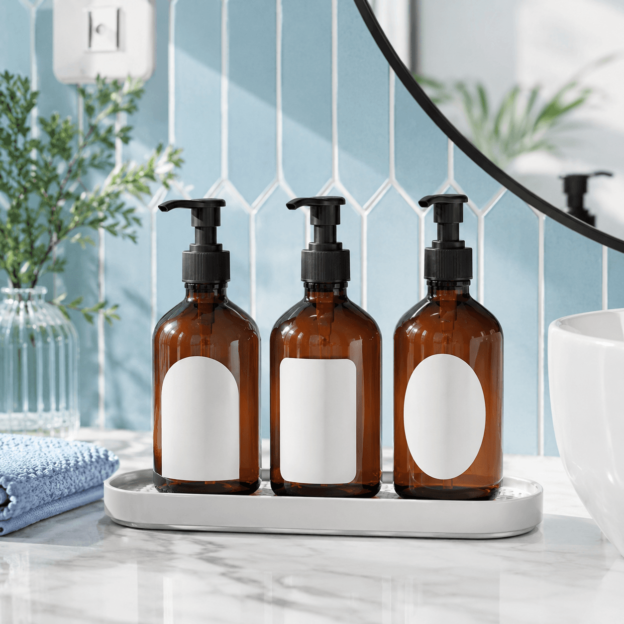 Refillable Dispenser Set arranged in a bright bathroom